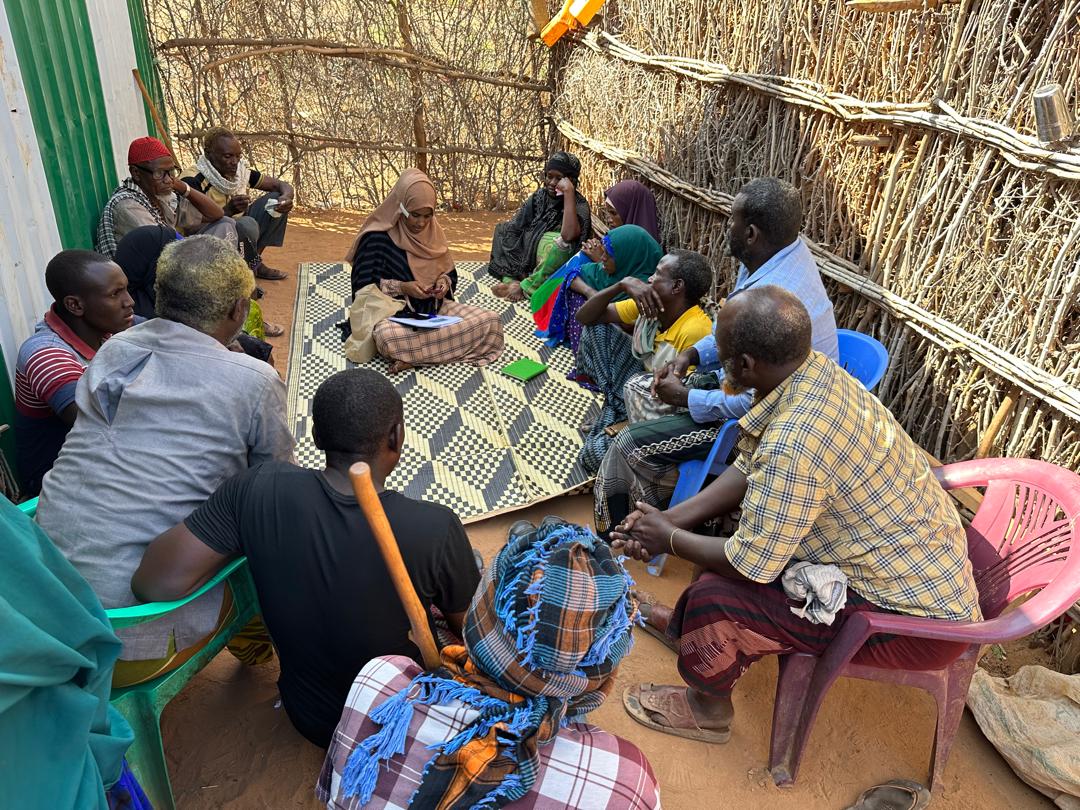 Modern office workspace with charts and digital analytics displayed on screens